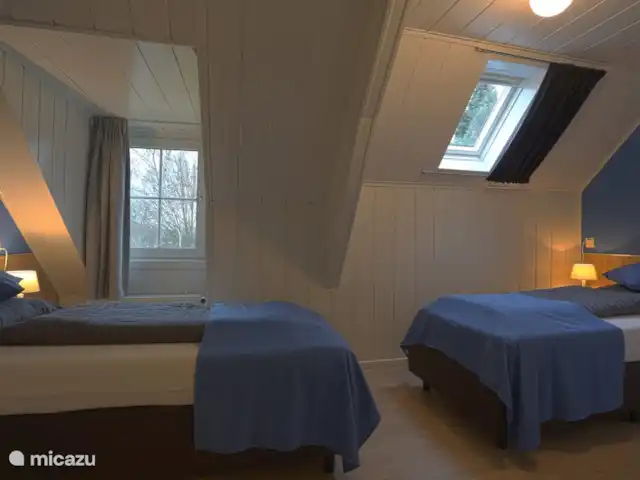 El Looische Hoeve en Países Bajos, Limburgo, Wellerlooi - casa de campo Dormitorio para 2 personas con vista al jardín.