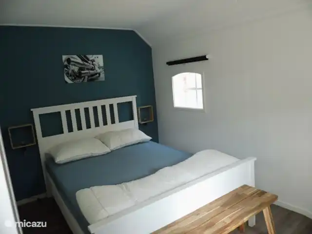 Wandelen, Nederland, Overijssel, Schalkhaar, boerderij Vakantieboerderij Deventer Bed in de kleine slaapkamer