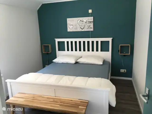 Wandelen, Nederland, Overijssel, Schalkhaar, boerderij Vakantieboerderij Deventer Bed in de grote slaapkamer