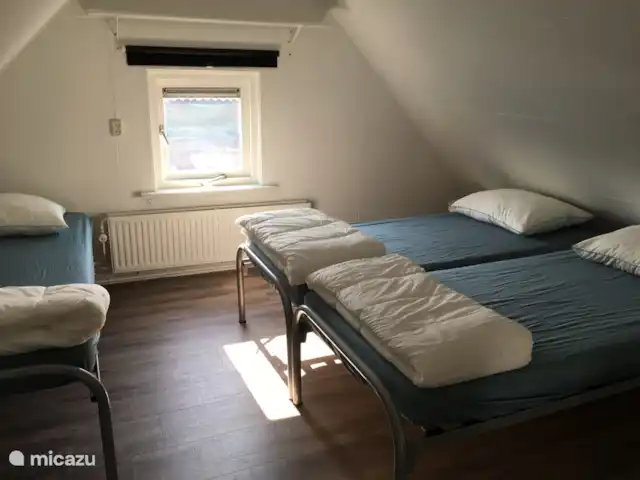 Wandelen, Nederland, Overijssel, Schalkhaar, boerderij Vakantieboerderij Deventer Slaapkamer links