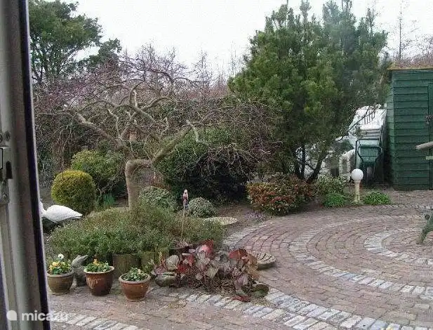 The spacious garden with a lovely terrace with complete privacy and all day sun