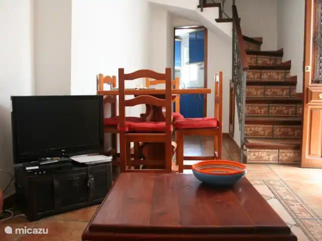 Location de Vacances Espagne, Andalousie, Guaro, maison de vacances - Casa Sonrisa La salle à manger dans le salon et la cuisine derrière.