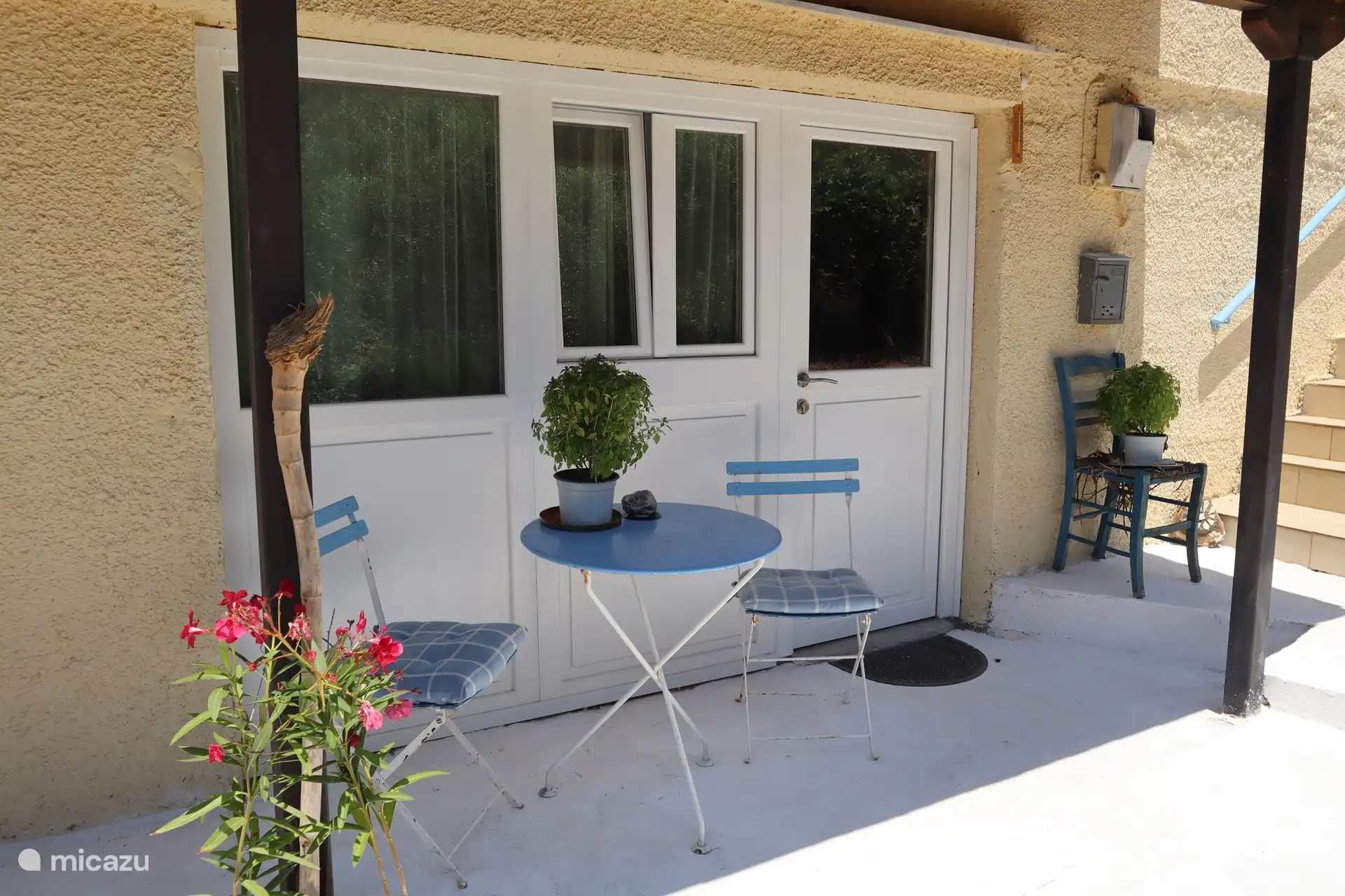 The front view of the downstairs apartment.