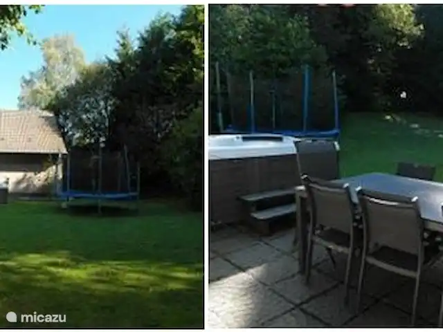 villa en Bélgica, Ardenas, Dochamps – Bonvie El jardín con terraza y cortavientos, sombrillas, jacuzzi, barbacoa, etc.
