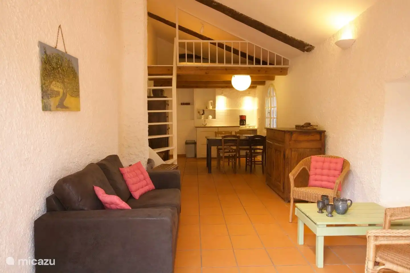 The living room seen from the entrance. The mezzanine and the kitchen diner are behind it.
