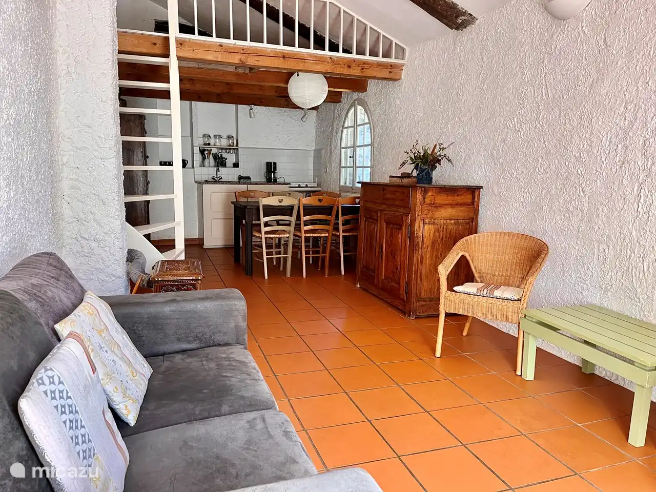 The stairs go to the mezzanine with two sleeping places, popular with children.