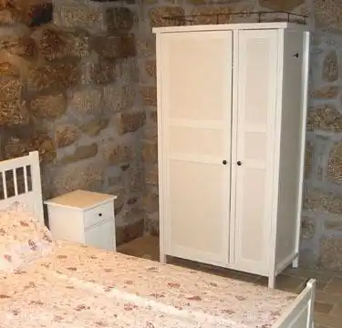The first floor bedroom for 2 adults. With its own sink and mirror.