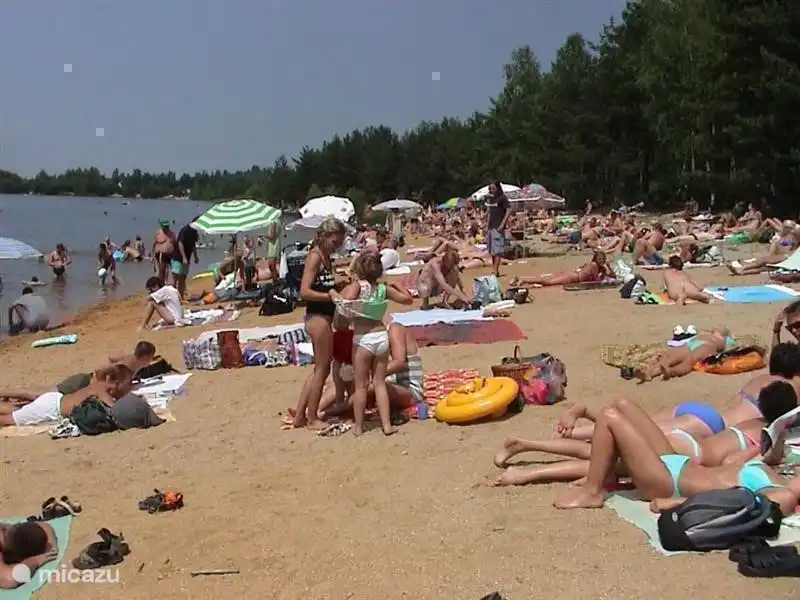 Recreational lake in Veseli nad Luznici. Beach and canoe