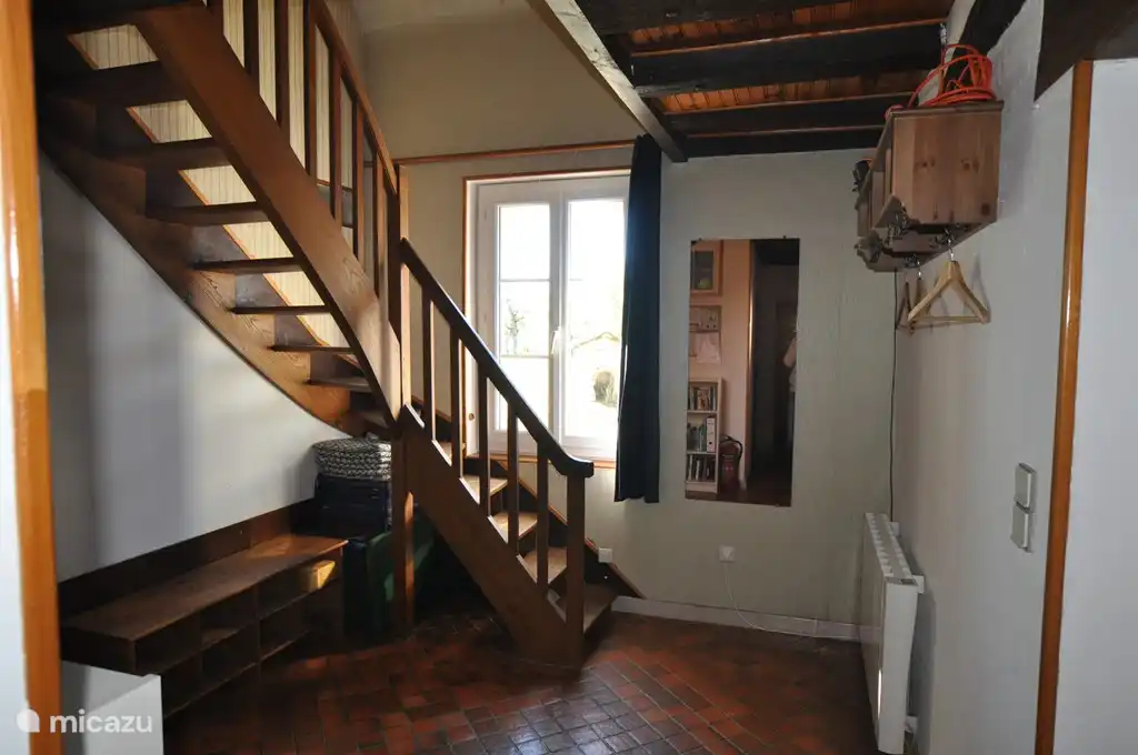 Hallway with stairs.