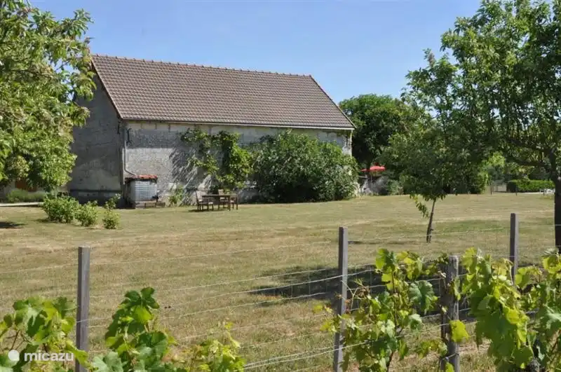 The barn with game field.