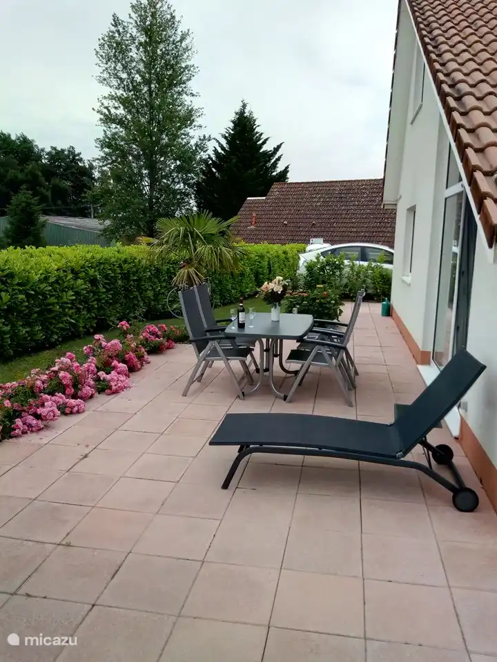 The terrace where you can sit in the shade of the house in the summer