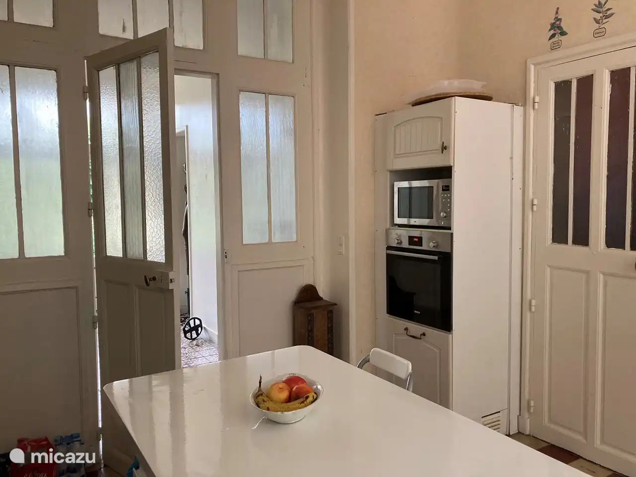 Kitchen with oven and microwave