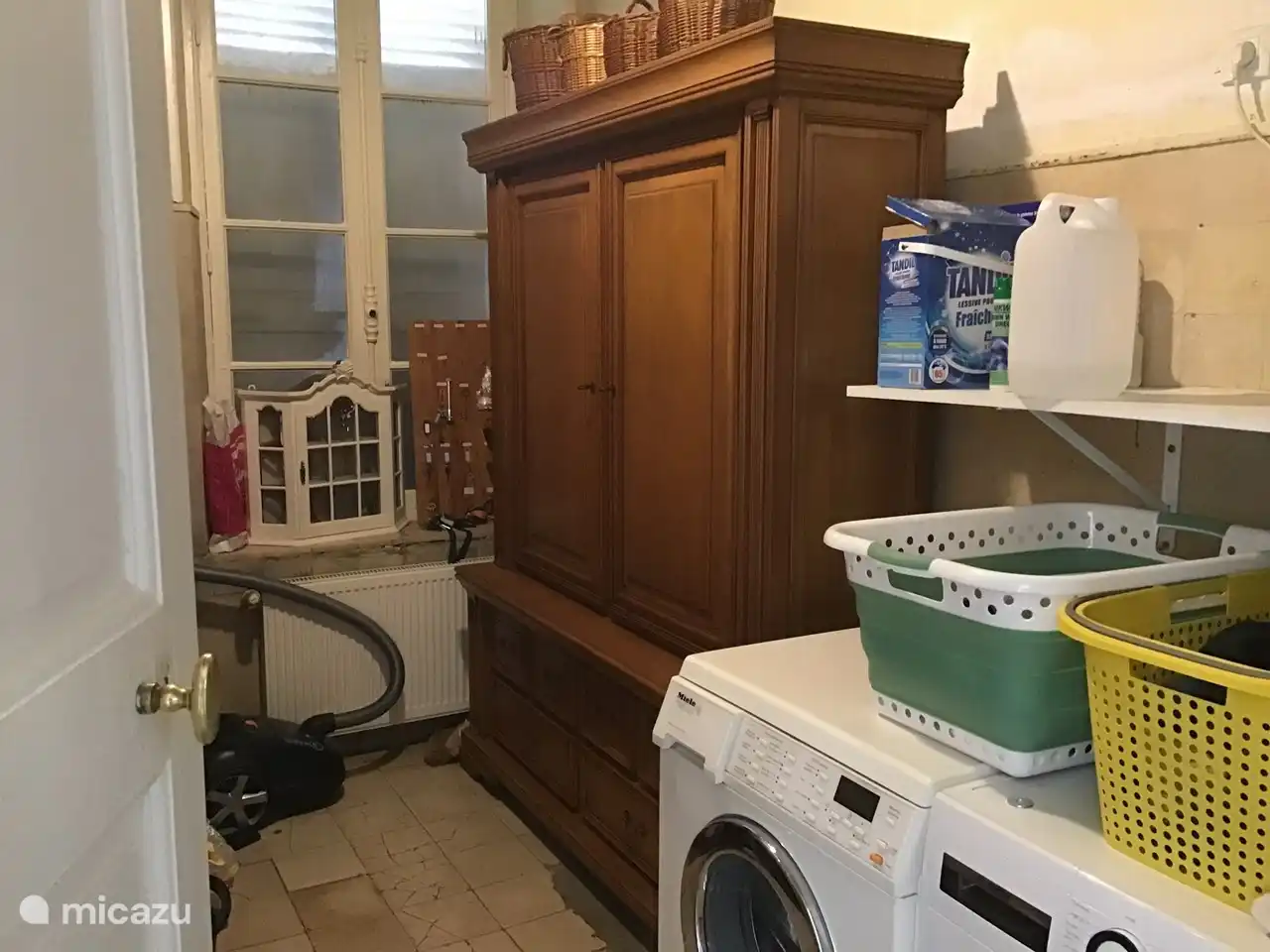 Laundry room with washing machine and dryer