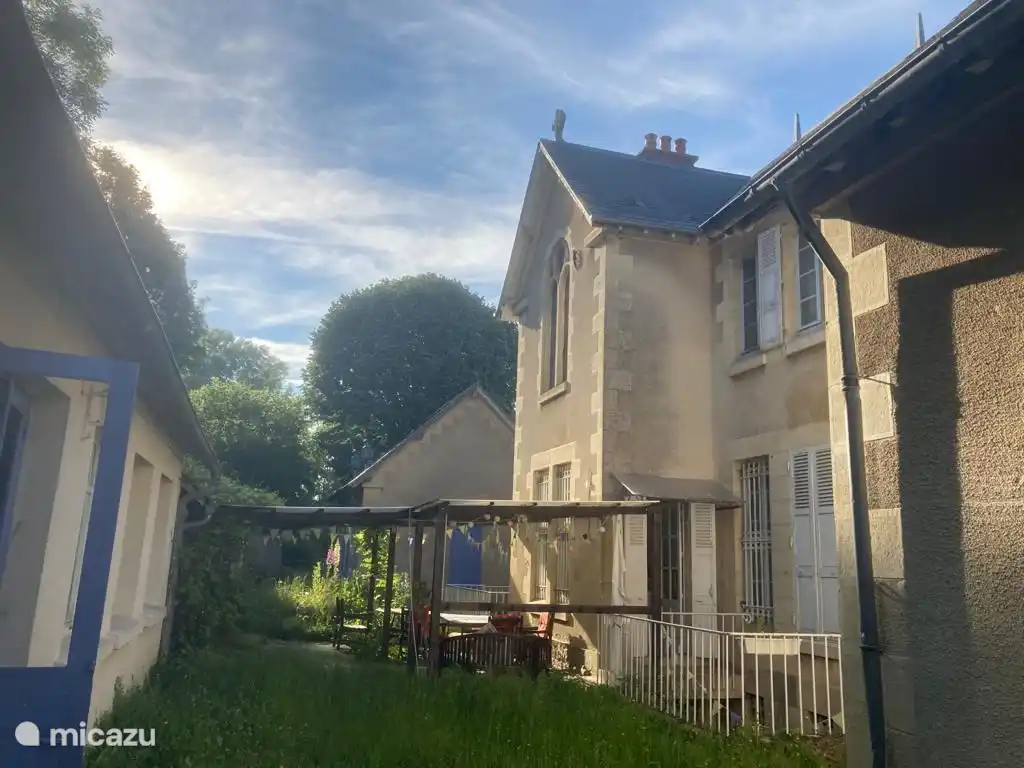The rear with a view of the covered terrace