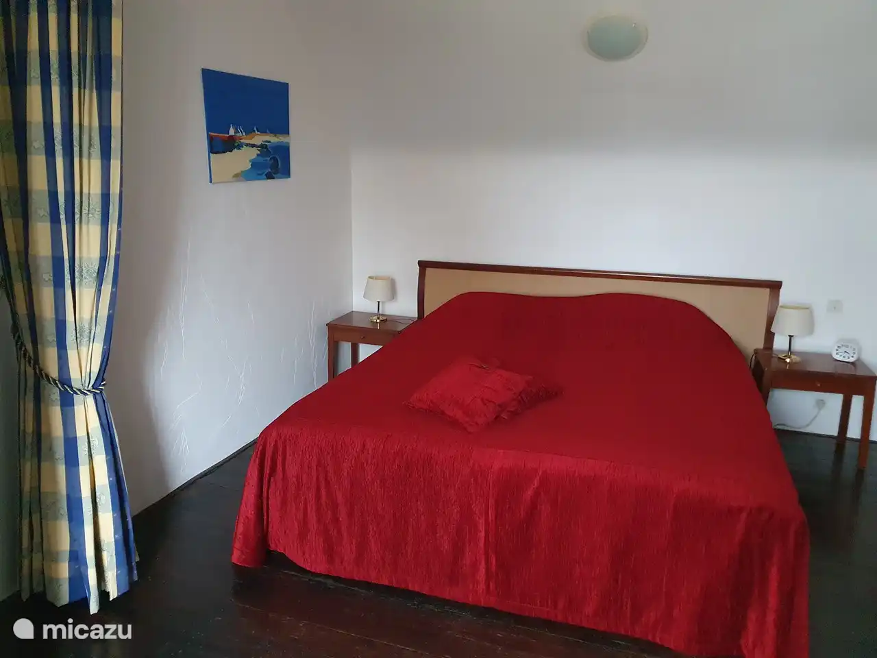 The second bedroom, with a twin bed. Here is a wardrobe and the bedroom has hot/cold water