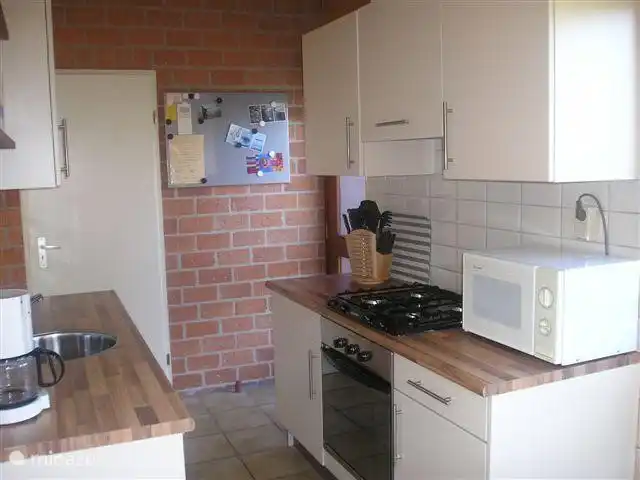 volledig ingerichte keuken. De keuken is geheel gerestaureerd en van alle gemakken voorzien.