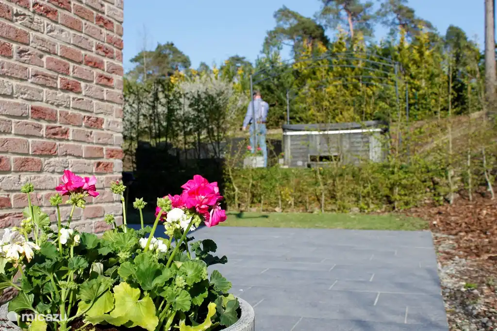Large terrace overlooking the jacuzzi.