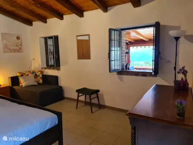 Casa Motta Camastra en Italia, Sicilia, Motta Camastra - casa vacacional Mire a través del conservatorio y el valle de Alcantara.