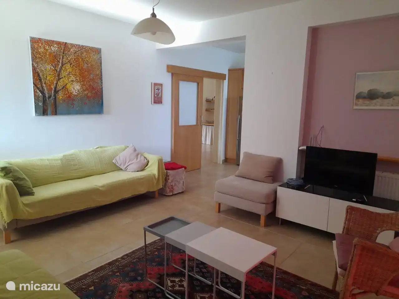 Sitting room with TV, of course the outdoor space is used most in our climate.