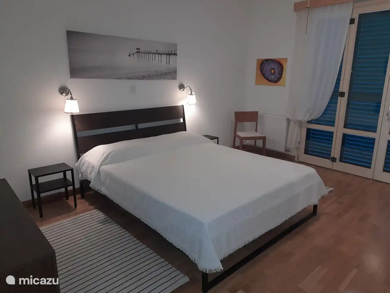 The 'master' bedroom, with patio doors to the patio.