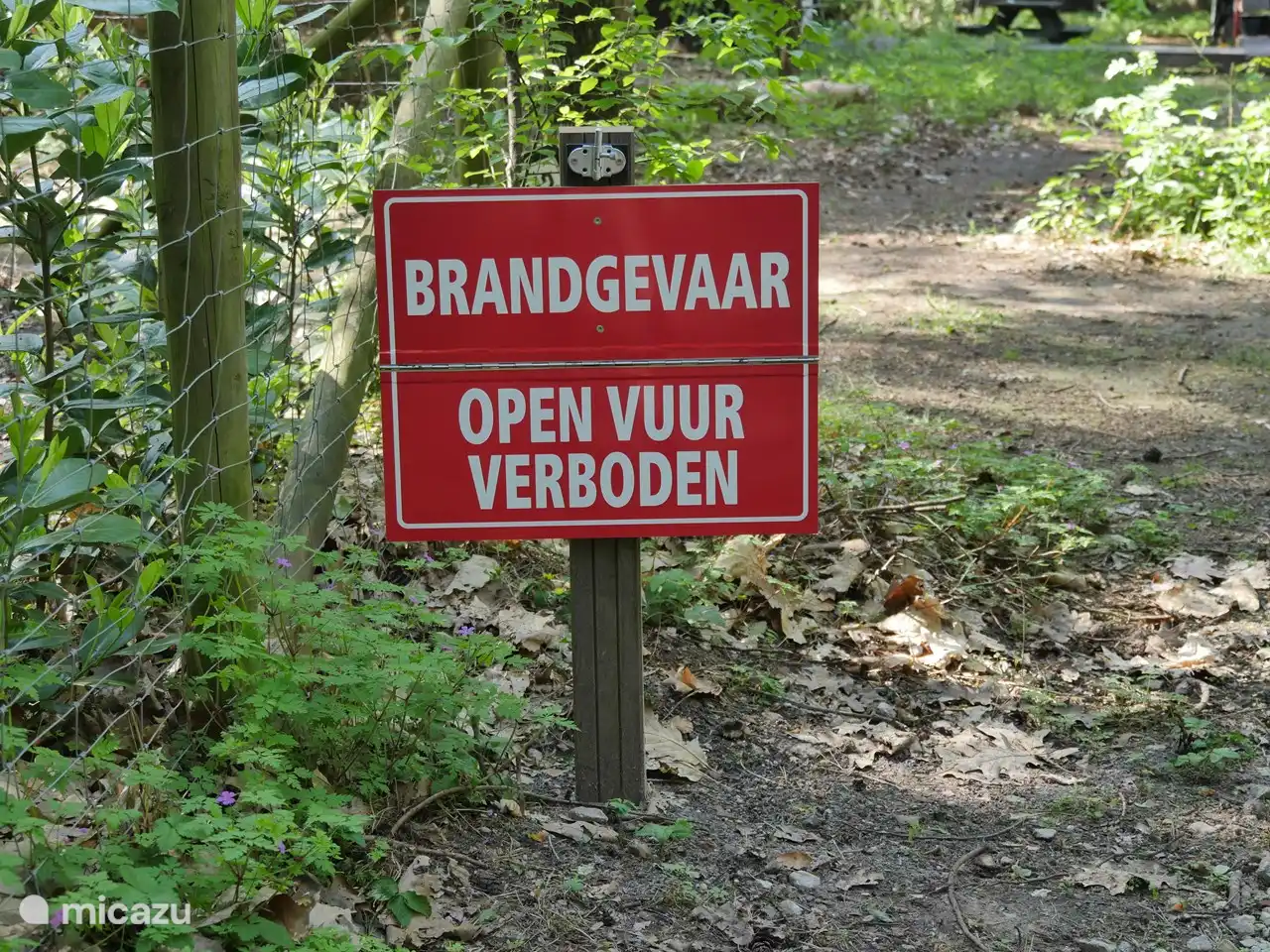 if this sign is folded open no wood stove on outside