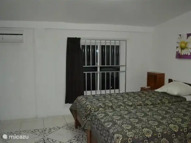 villa en Surinam, Paramaribo, Paramaribo – Oso Noemí Cuarto dormitorio con aire acondicionado.