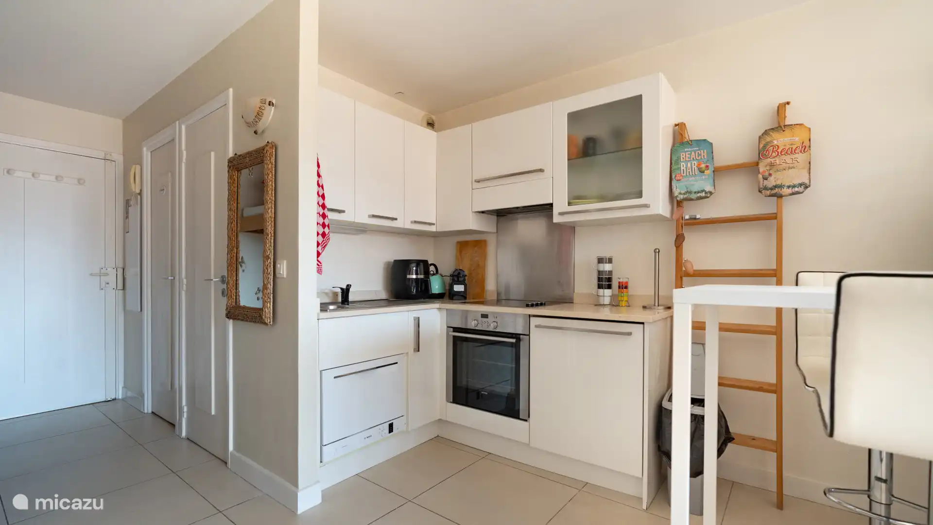 Comedor / Cocina / Armario de la lavadora / Entrada al baño