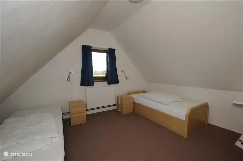 Dormitorio 3. La habitación más pequeña con 2 camas individuales.