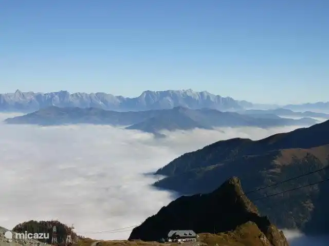 Va et Vient Zell am See/Kaprun en Austria, Salzburgo, Kaprun - chalet Esquiar en Kaprun en octubre por encima de las nubes. Una experiencia única de vacaciones de otoño. 300 días de esquí al año.