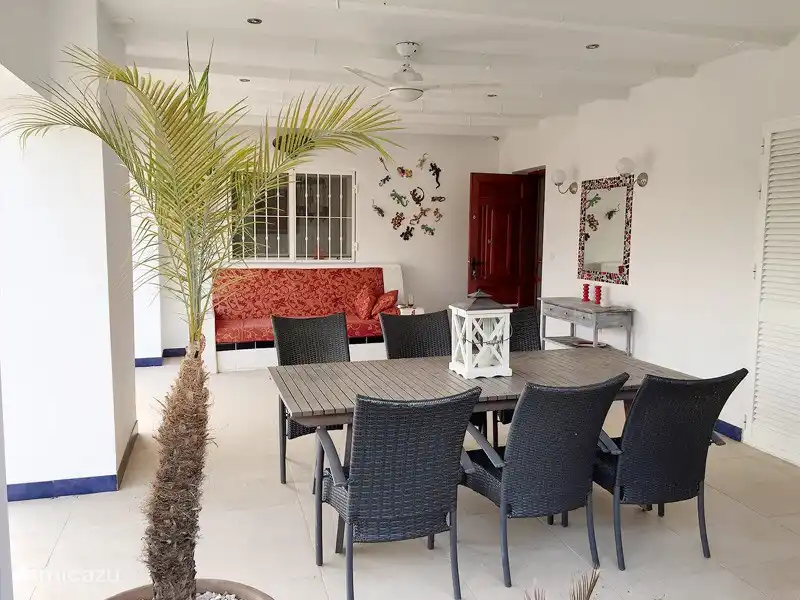 The covered part with ceiling fan.