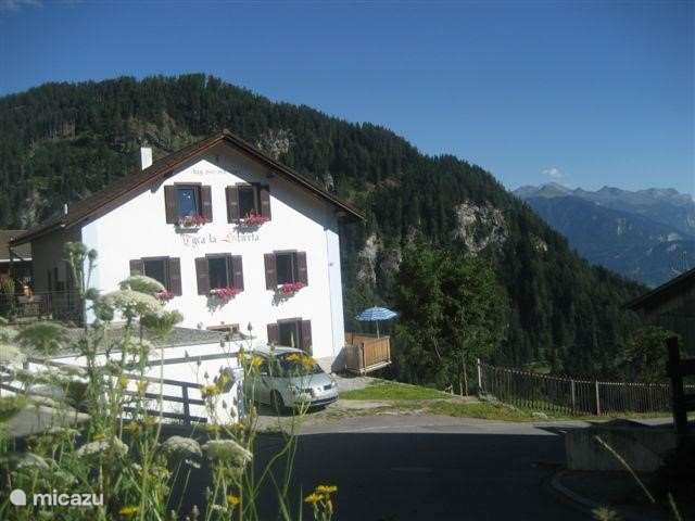 Wintersport, Zwitserland, Graubünden, Scheid, vakantiehuis Tgea La Stierta (huis in de bocht)