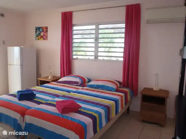 Location de Vacances Curaçao, Banda Abou (ouest), Lagun, maison de vacances - Maison Coeur de Dauphin Un regard à l'intérieur d'un studio à la Dolphin Heart House