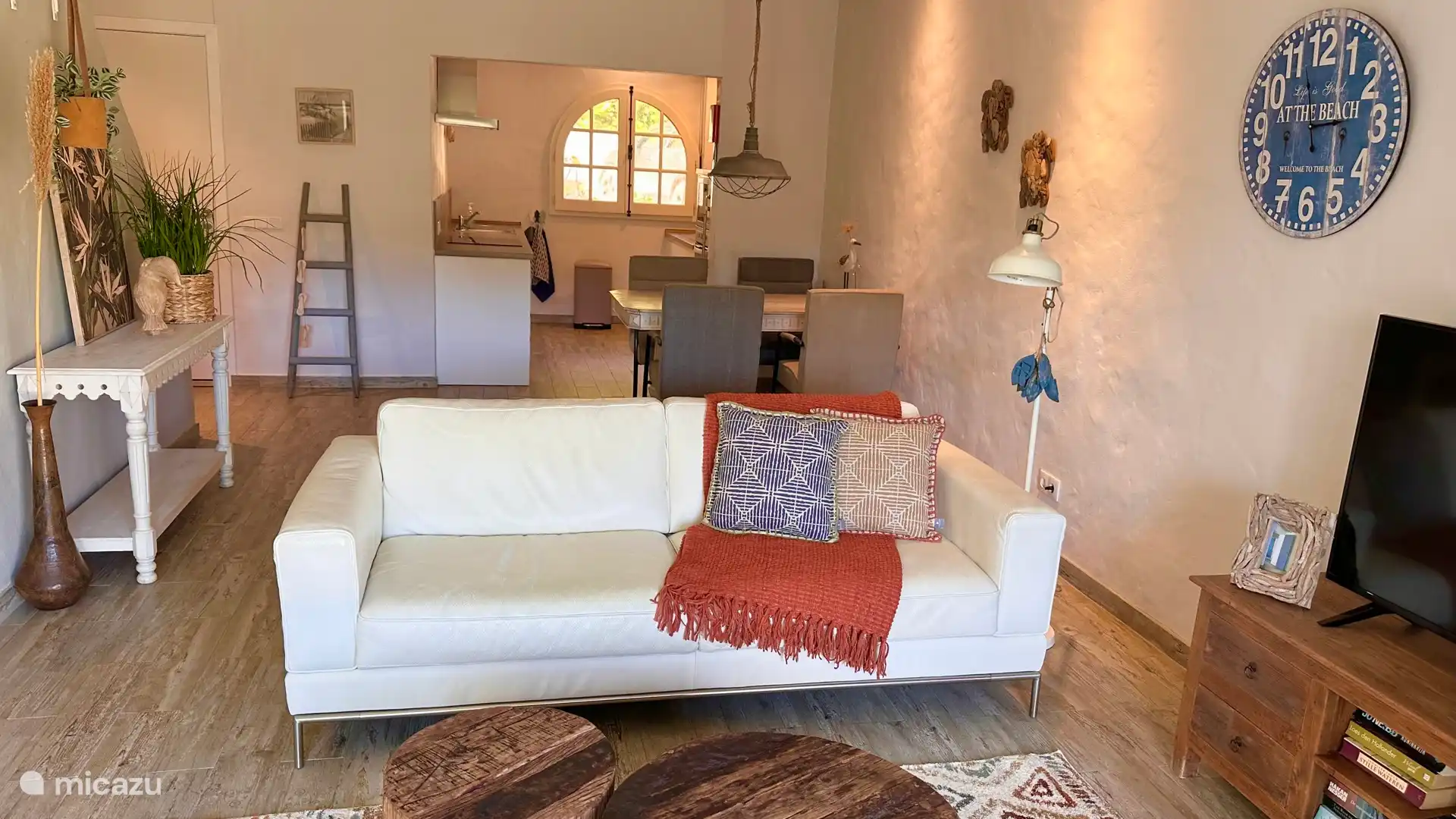 living area with a view of the kitchen