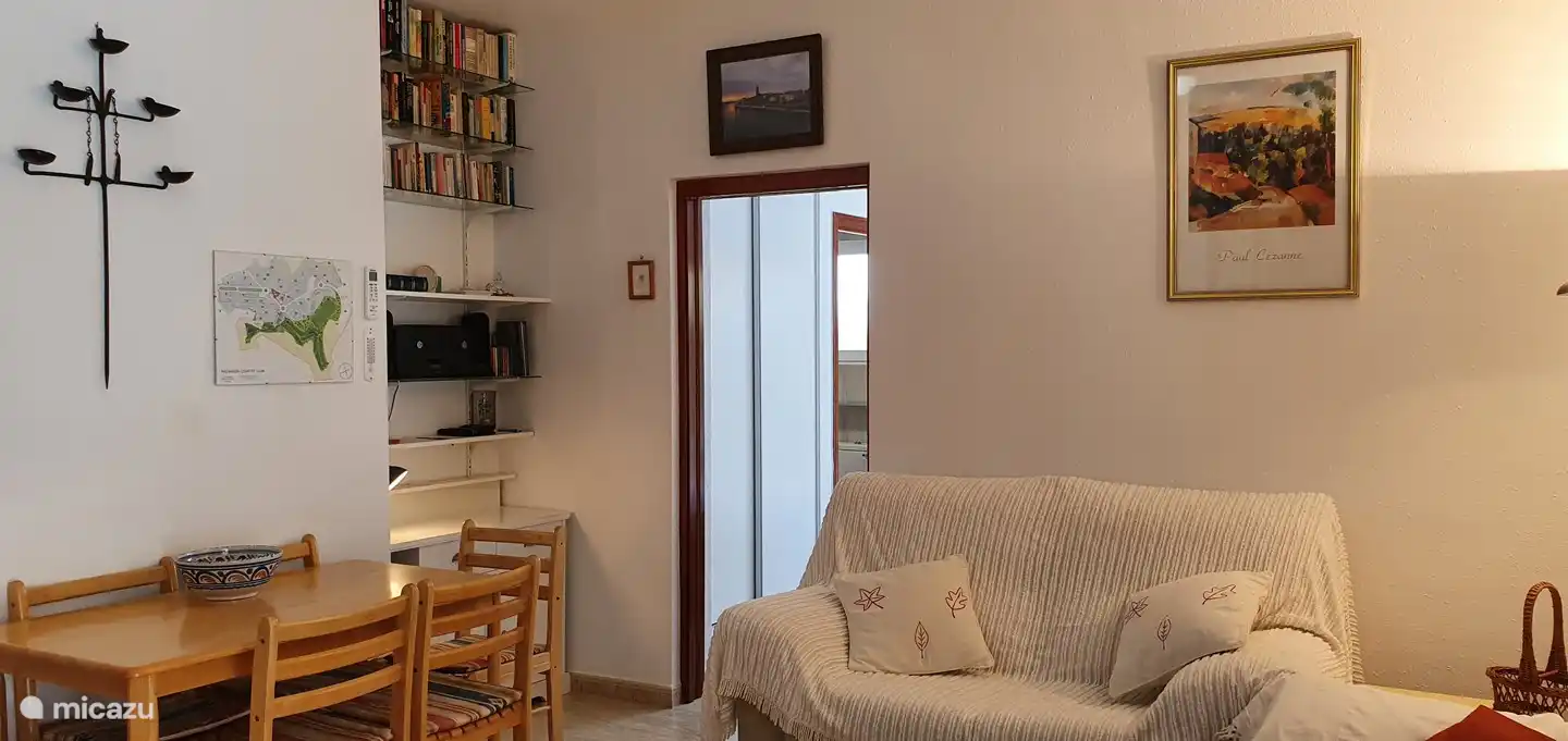 Dining area, bookcase and the view to the new 3rd bedroom