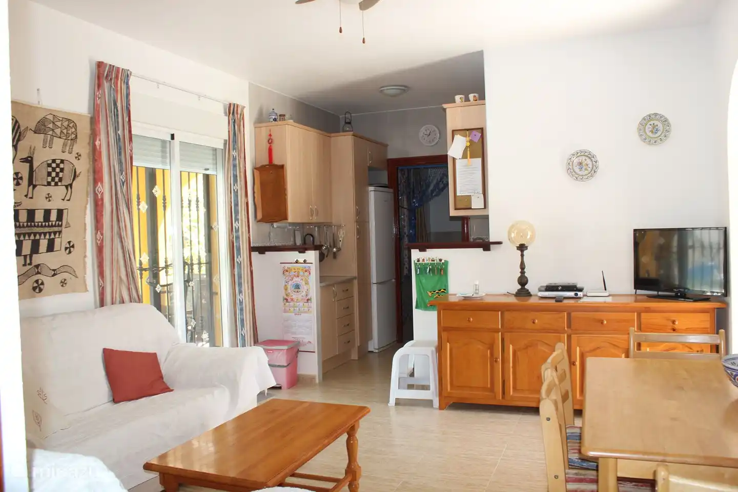 Living room with a view to the kitchen, flat screen TV on the sideboard [all Dutch channels and many foreign], wifi signal