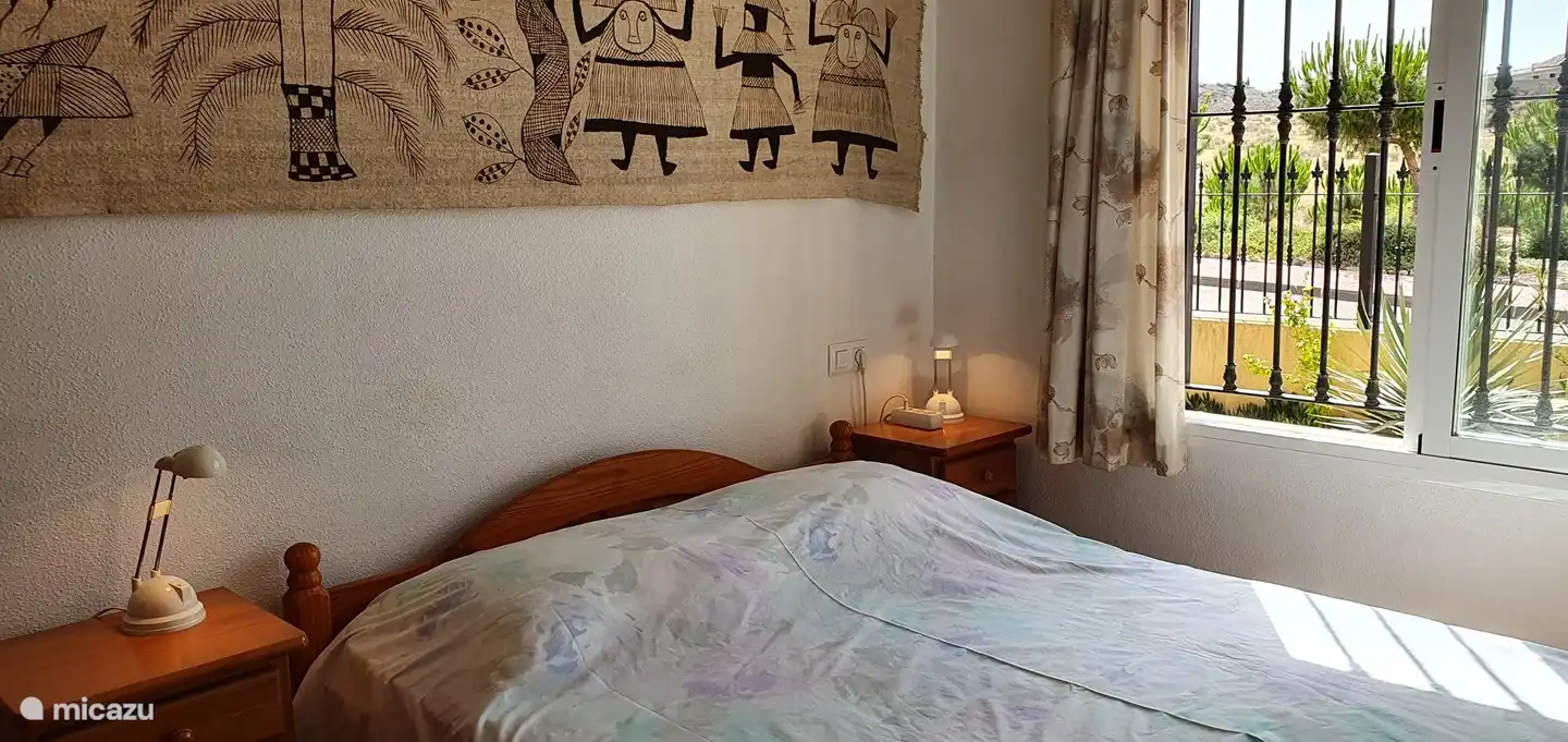 Bedroom with 1x 2 pers. bed [140 x 200 cm], 2 bedside tables and spacious fitted wardrobes