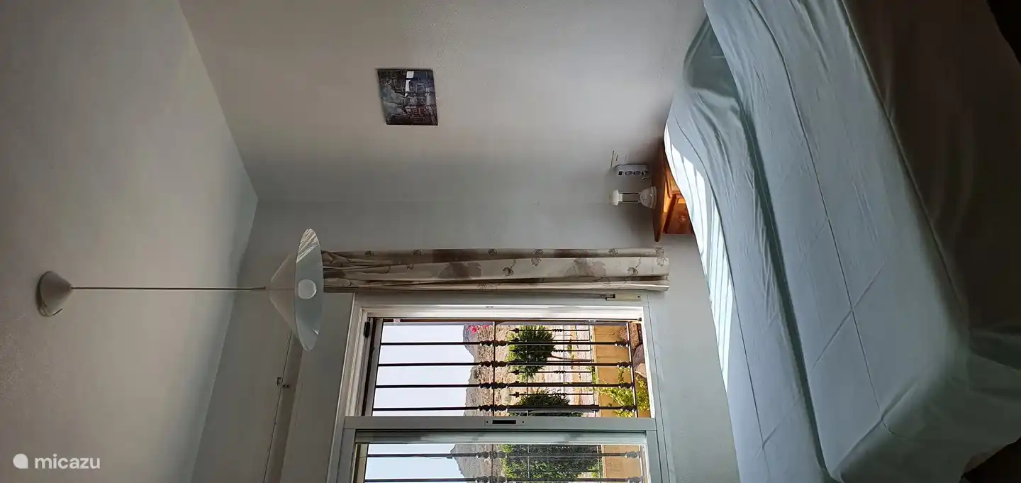 Bedroom with 2x 1 pers. beds [ 80 x 200 cm ] 2 bedside tables and spacious fitted wardrobes