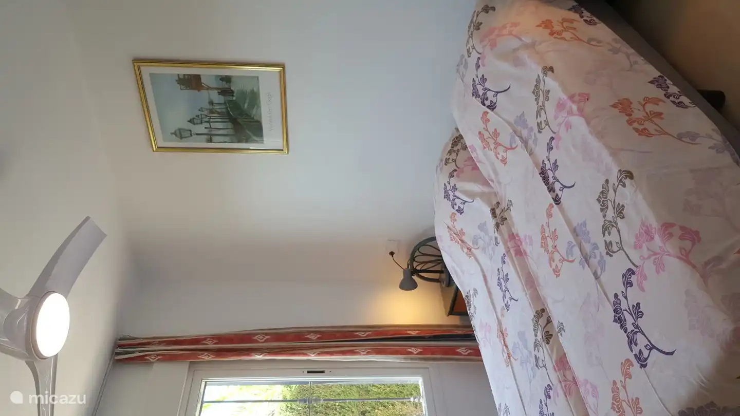 This room has a ceiling fan, generous wall cupboard and extra wall cupboard