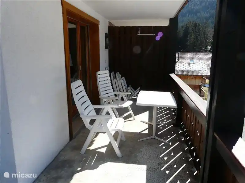 The balcony is both at the front and the side. South-west. So all day sun.