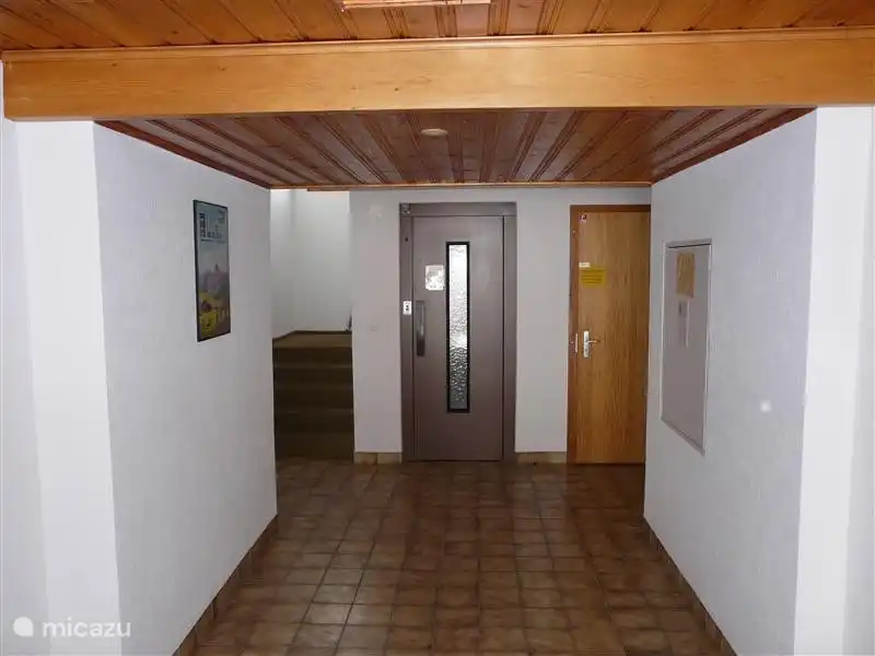 Hall downstairs with elevator.