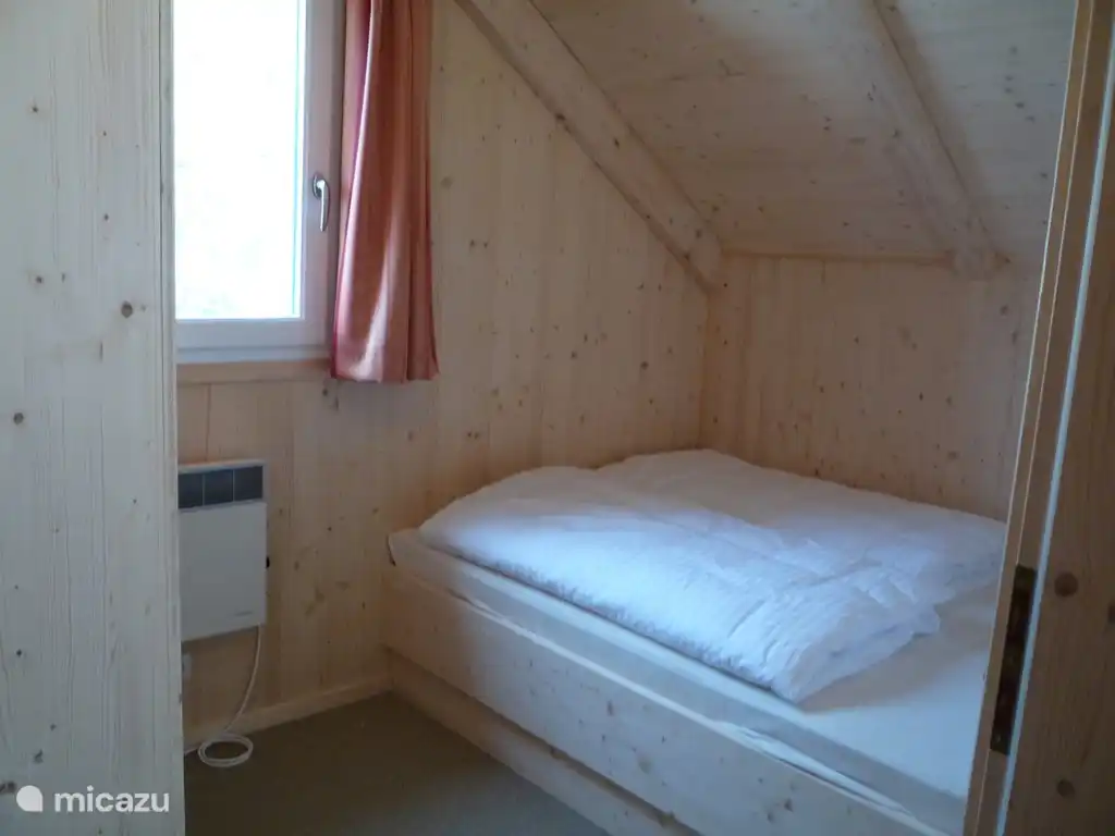 dormitorio no.4 con una cama doble