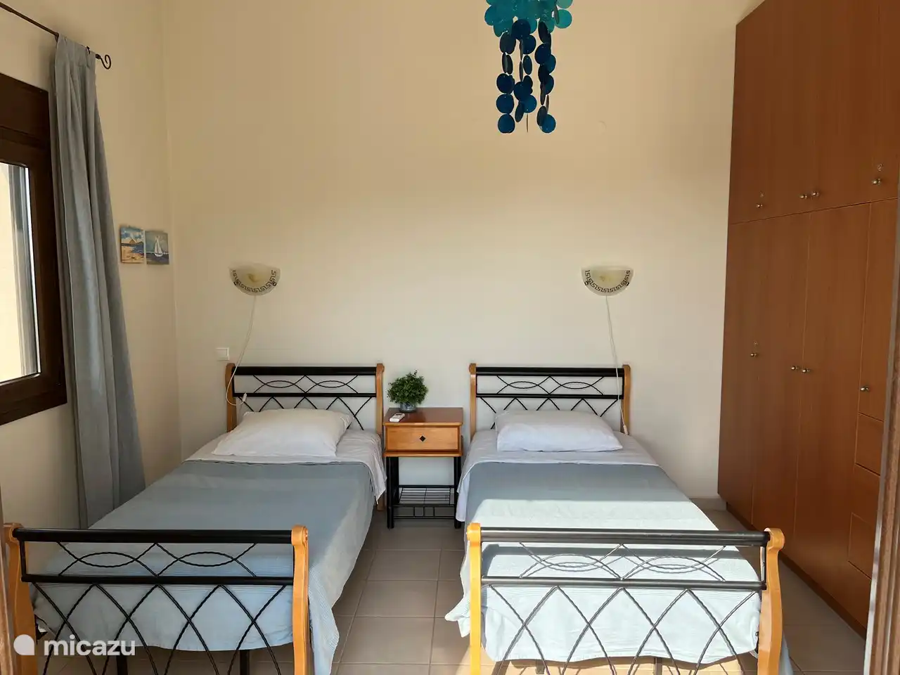 Doppelzimmer mit Terrassentüren zur Dachterrasse. Zimmer 2