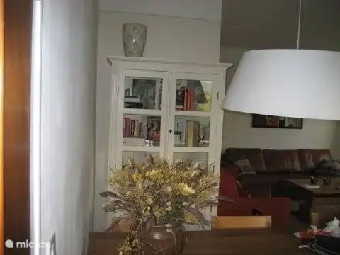 Tastefully furnished living room with comfortable sofas and a sturdy table.