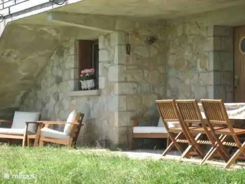 Large dining table which can be extended and can accommodate 8-10 people.