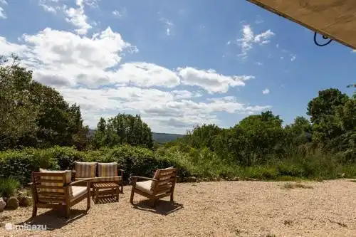 One of the cozy seating areas around the villa with great views