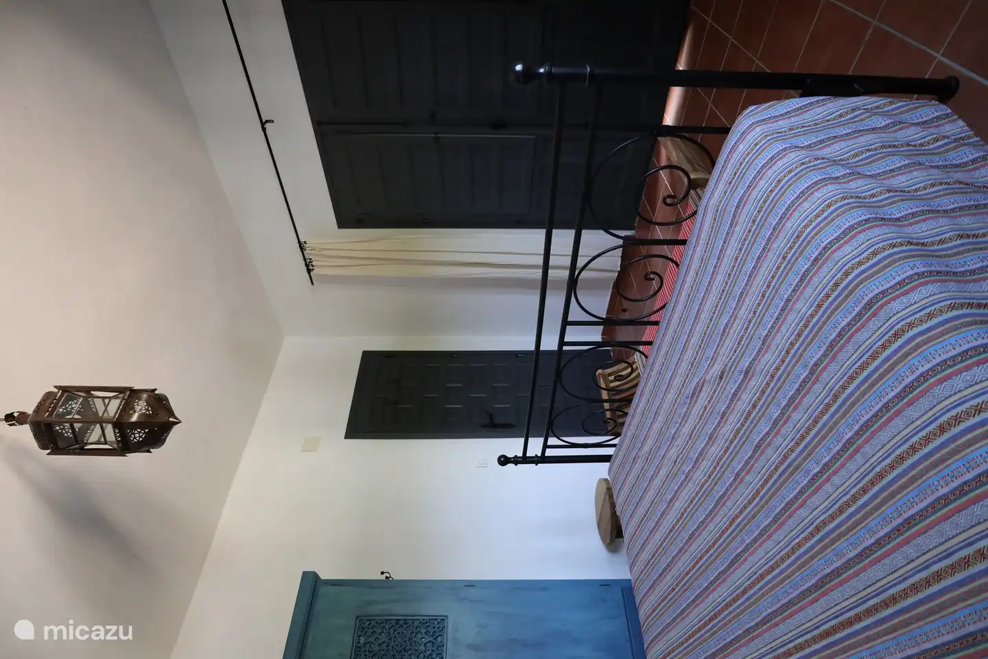 Second bedroom with patio doors to veranda