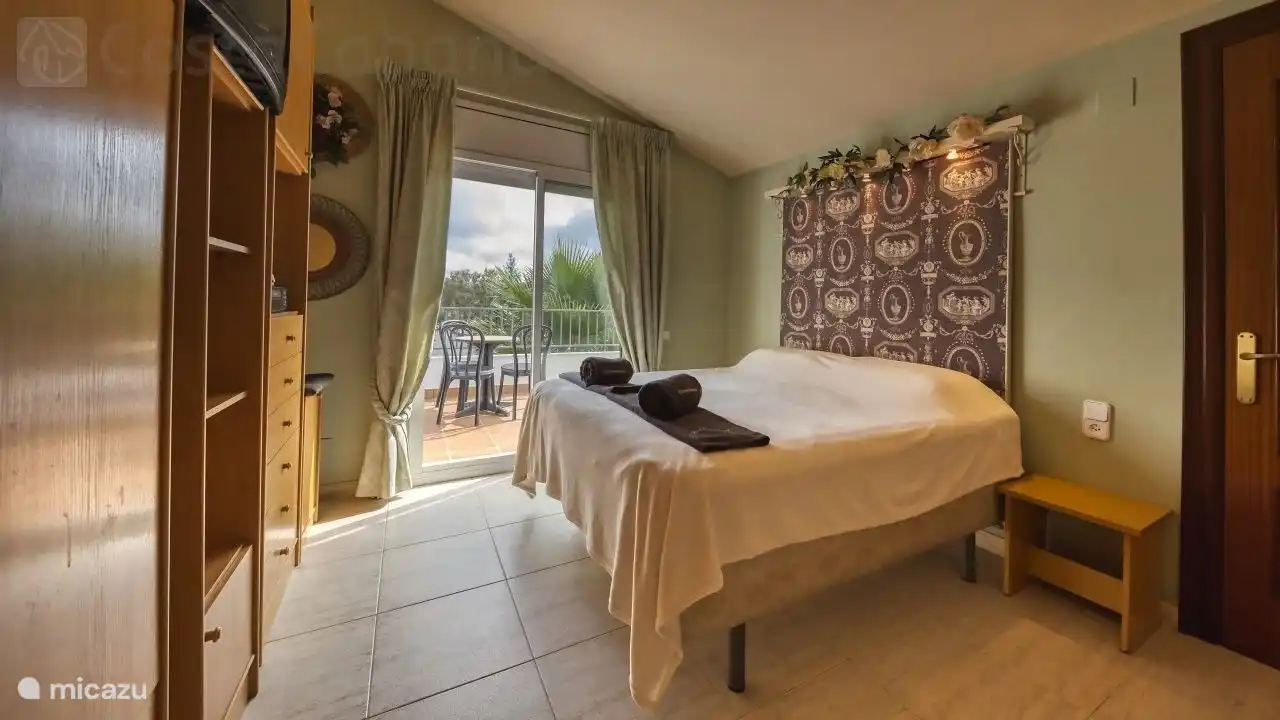 Slaapgelegenheid in 1 van de appartementen boven