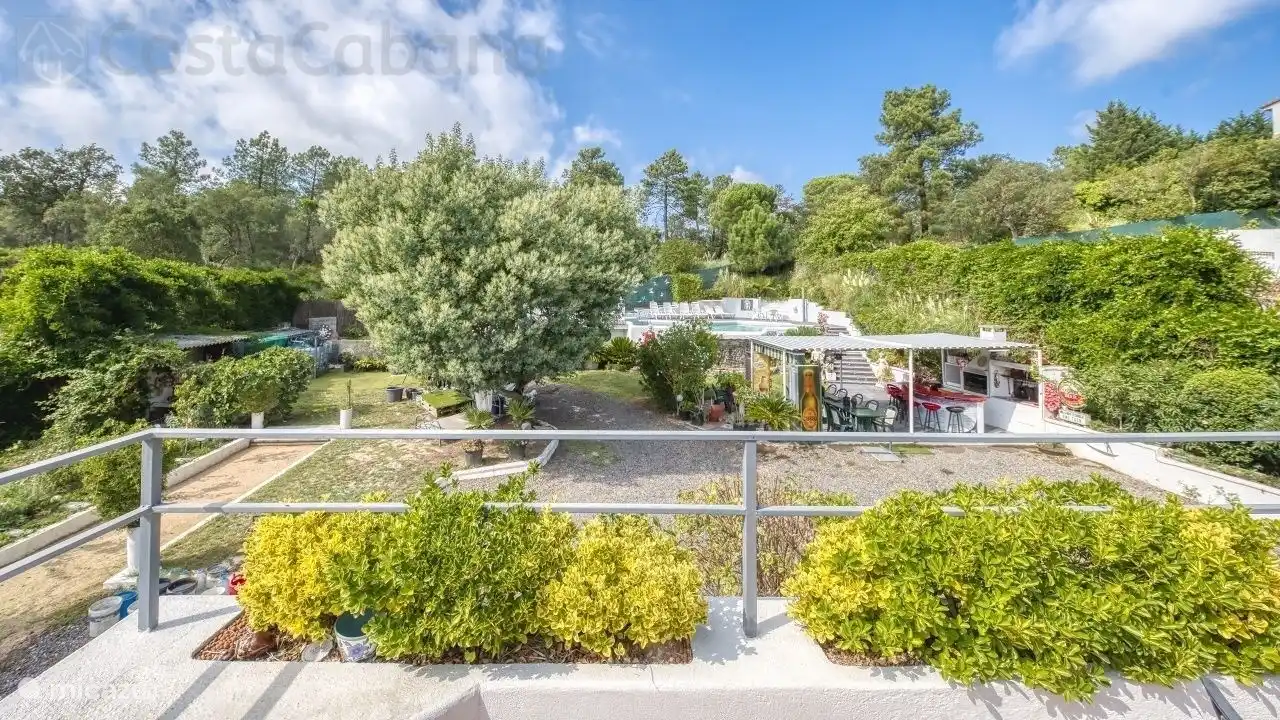 Balkon met uitzicht over de tuin
