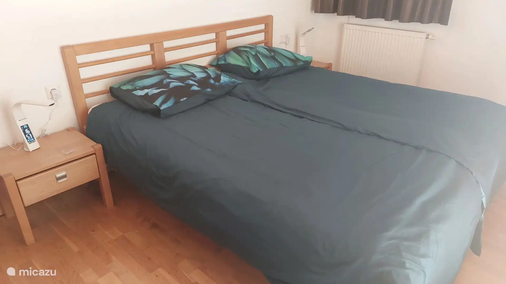 Geräumiges Schlafzimmer mit Doppelbett (180*200).