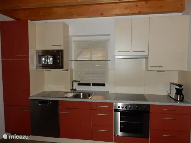 chalet en Austria, Carintia, Kötschach-Mauthen – casa de campo La cocina atractiva y totalmente equipada.